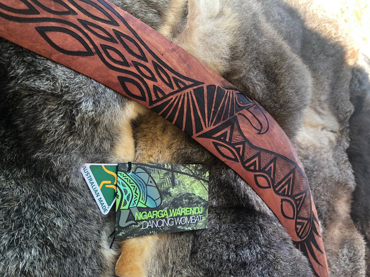 X-Large Bundjil the Wedge Tailed Eagle Wangim / Boomerang. Made from Redgum timber.  Hand Crafted in Australia.  All artefacts come with an information card.  The card has information about the artist, artefact and design. All our wangim are made from timber collected from tree roots or branches that have a natural bend. All designs are based on traditional symbols from South East Australia