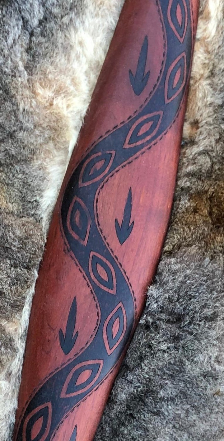 Traditionally malgarr ( shields ) were used with liyangayil (fighting clubs) for hand to hand combat with our enemies. I have replicated the shape of these shields in my artwork. Barring is a track that our old people used for walking to a different country. They also used tracks as part of complex trade route system. Animals also have their own tracks, which we use to warranwgan ( hunt ) them. Hand crafted in Australia from Australian Red Cedar timber.