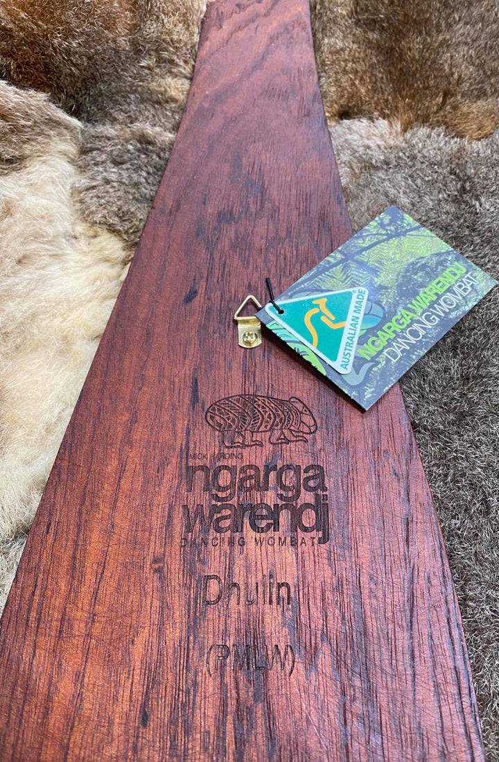 Parrying Malgarr - Large Wide with Dhulin the Goanna Design. Traditionally malgarr ( shields ) were used with liyangayil (fighting clubs) for hand to hand combat with our enemies. I have replicated the shape of these shields in my artwork. Hand crafted in Australia from Australian Red Cedar timber. All artefacts come with an information card. The card has information about the artist, artefact and design. All designs are based on traditional Aboriginal symbols from South East Australia.