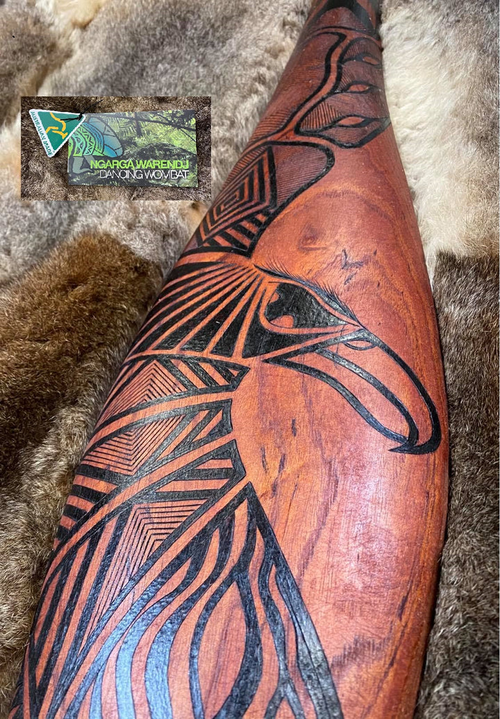 Parrying Malgarr - Large Wide with Bunjil the Wedge Tailed Eagle Design.    Traditionally malgarr ( shields ) were used with liyangayil (fighting clubs) for hand to hand combat with our enemies.  I have replicated the shape of these shields in my artwork.  Hand crafted in Australia from Australian Red Cedar timber.  All artefacts come with an information card.  The card has information about the artist, artefact and design.  All designs are based on traditional Aboriginal symbols from South East Australia.