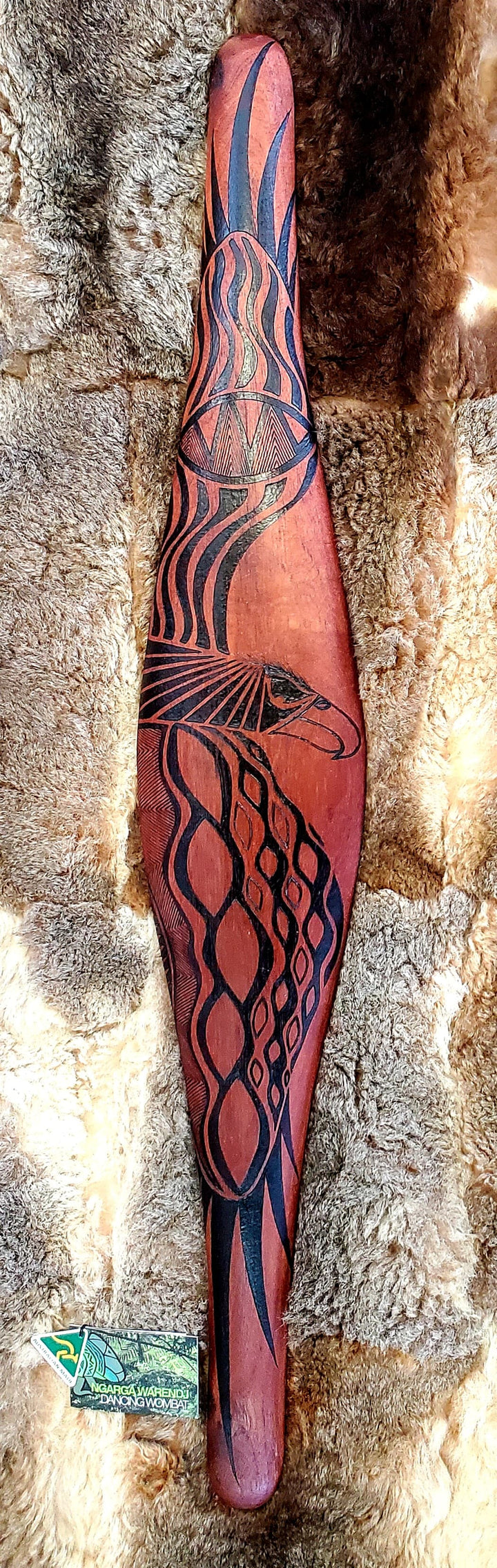Parrying Malgarr - Large Wide with Bunjil the Wedge Tailed Eagle Design.    Traditionally malgarr ( shields ) were used with liyangayil (fighting clubs) for hand to hand combat with our enemies.  I have replicated the shape of these shields in my artwork.  Hand crafted in Australia from Australian Red Cedar timber.  All artefacts come with an information card.  The card has information about the artist, artefact and design.  All designs are based on traditional Aboriginal symbols from South East Australia.