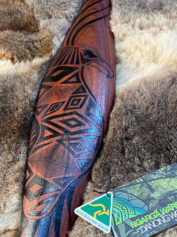 Medium Parrying Malgarr with Bunjil the Wedge Tailed Eagle Design. Traditionally malgarr ( shields ) were used with liyangayil (fighting clubs) for hand to hand combat with our enemies. I have replicated the shape of these shields in my artwork. Hand crafted in Australia from Australian Red Cedar timber. All artefacts come with an information card. The card has information aboutthe artist, artefact and design. All designs are based on traditional Aboriginal symbols from South East Australia.