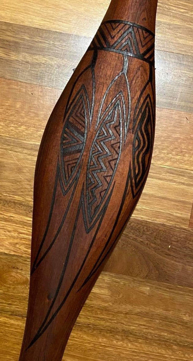 Parrying Malgarr Shield with Womindjeka Gum Leaves Design. Traditionally malgarr ( shields ) were used with liyangayil ( fighting clubs) for hand to hand combat with our enemies. I have replicated the shape of these shields in my artwork.