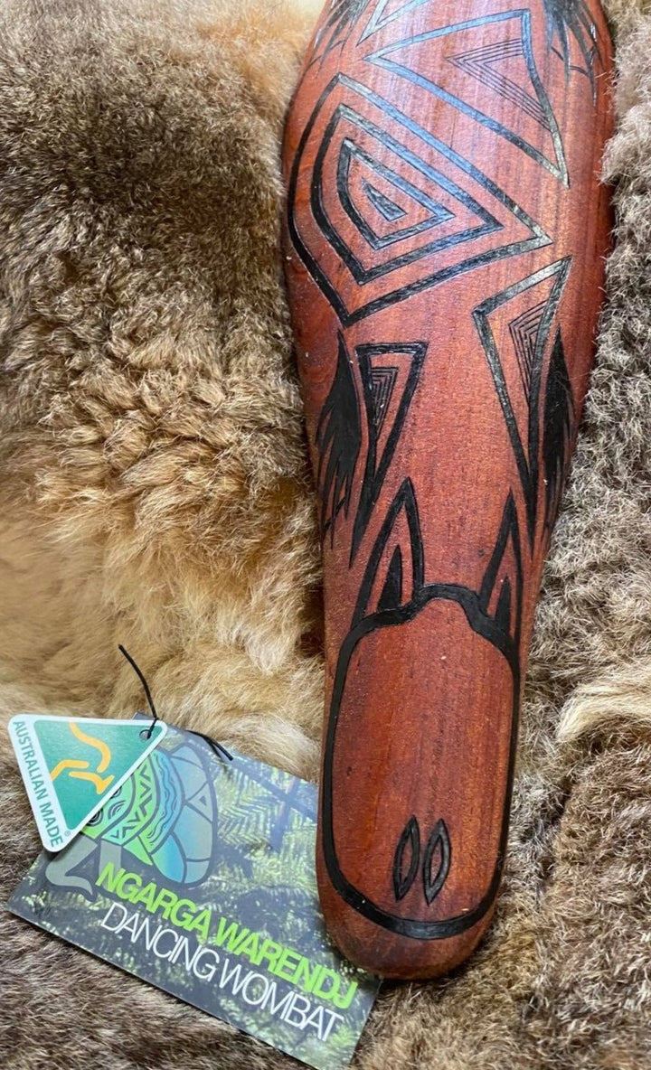 Ngarga Warendj Dancing Wombat Parrying Malgarr Shield with Budja the Platypus Design. Hand crafted in Australia from Australian Red Cedar timber. All artefacts come with an information card. The card has information about the artist, artefact and design. All designs are based on traditional symbols from South East Australia. Mick Harding