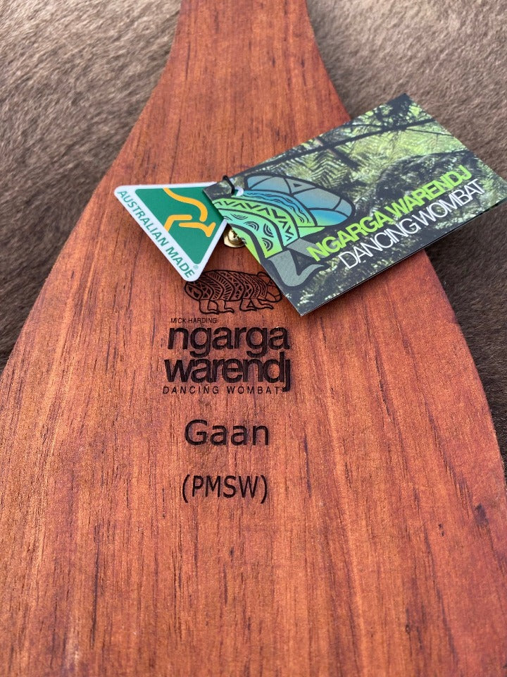 Parrying Malgarr Shield with Gaan the Cockatoo Design.    Hand crafted in Australia from Australian Red Cedar timber. All artefacts come with an information card.   The card has information about the artist, artefact and design.   All designs are based on traditional symbols from South East Australia.