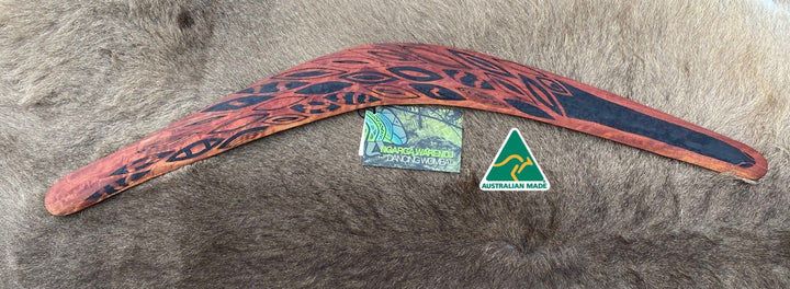 Large Gawarrn the Echidna Wangim / Boomerang. Made from Redgum timber.  Hand Crafted in Australia.  All artefacts come with an information card.  The card has information about the artist, artefact and design. All our wangim are made from timber collected from tree roots or branches that have a natural bend. All designs are based on traditional symbols from South East Australia