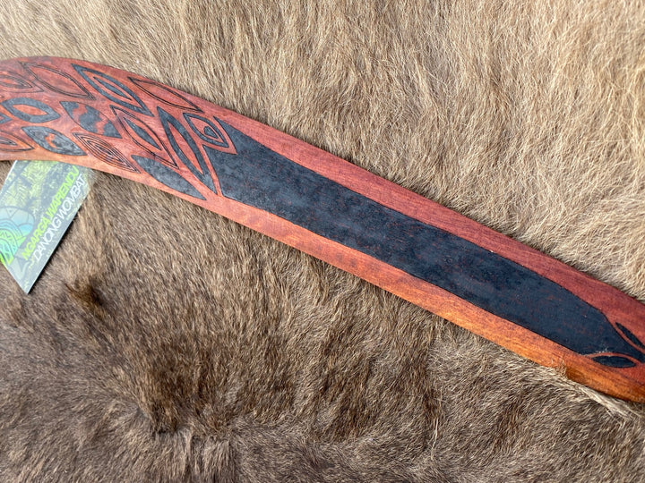 Large Gawarrn the Echidna Wangim / Boomerang. Made from Redgum timber.  Hand Crafted in Australia.  All artefacts come with an information card.  The card has information about the artist, artefact and design. All our wangim are made from timber collected from tree roots or branches that have a natural bend. All designs are based on traditional symbols from South East Australia