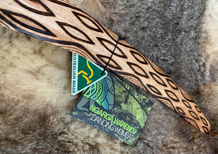 Large Barring Tracks Wangim / Boomerang. Hand Crafted in Australia by Ngarga Warendj. All our wangim are made from timber collected from tree roots or branches that have a natural bend. All designs are based on traditional symbols from South East Australia