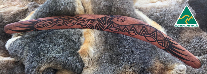 X-Large Bundjil the Wedge Tailed Eagle Wangim / Boomerang. Made from Redgum timber.  Hand Crafted in Australia.  All artefacts come with an information card.  The card has information about the artist, artefact and design. All our wangim are made from timber collected from tree roots or branches that have a natural bend. All designs are based on traditional symbols from South East Australia