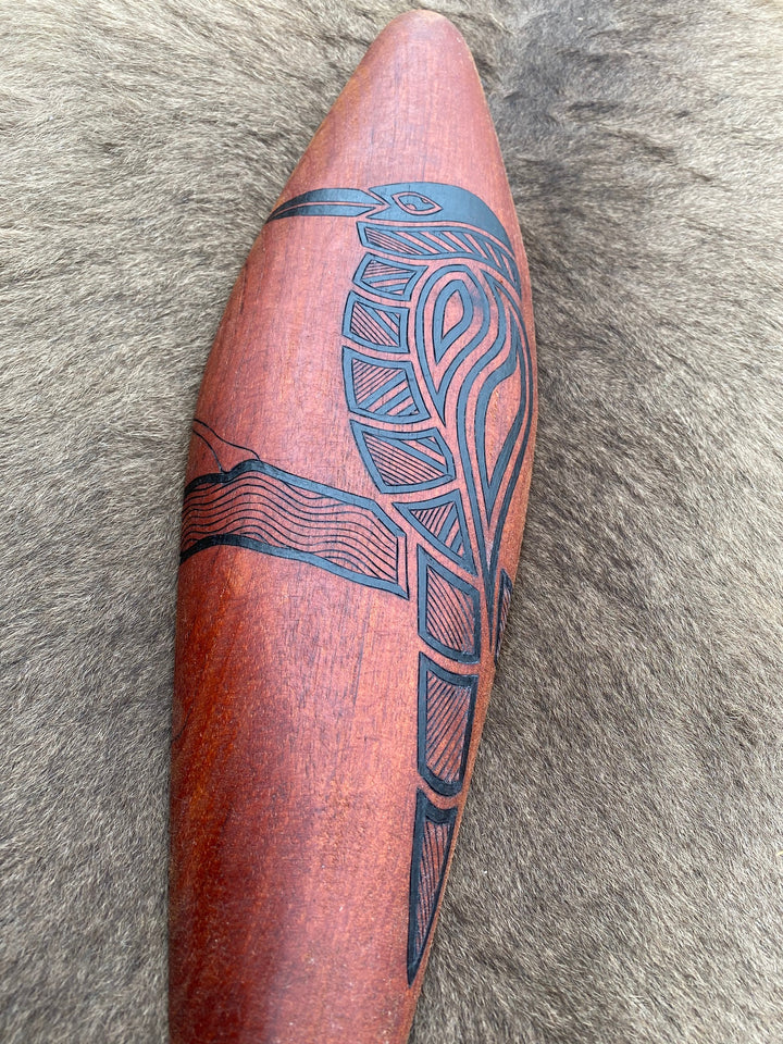 Traditionally malgarr ( shields ) were used with liyangayil ( fighting clubs)  for hand to hand combat with our enemies.  I have replicated the shape of these shields in my artwork.  Garrng Garrng is the Taungwurrung name for the Kookaburra. It is a bird that is known for its distinctive laugh and is a skilled hunter  with its large beak.  You can often hear Garrng Garrng early in the  morning, laughing in the distance.   Hand crafted in Australia from Australian Red Cedar timber.