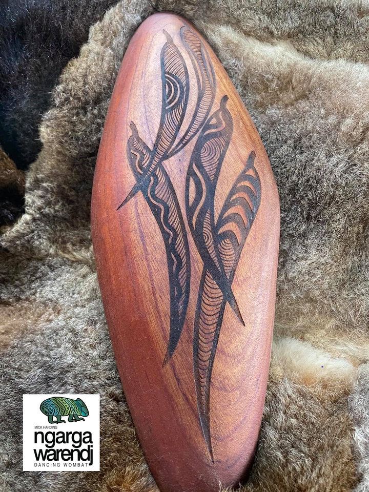 Wall Malgarr Shield with Womindjeka Gum Leaves Design. Traditionally malgarr ( shields ) were used with liyangayil ( fighting clubs) for hand to hand combat with our enemies. I have replicated the shape ofthese shields in my artwork.