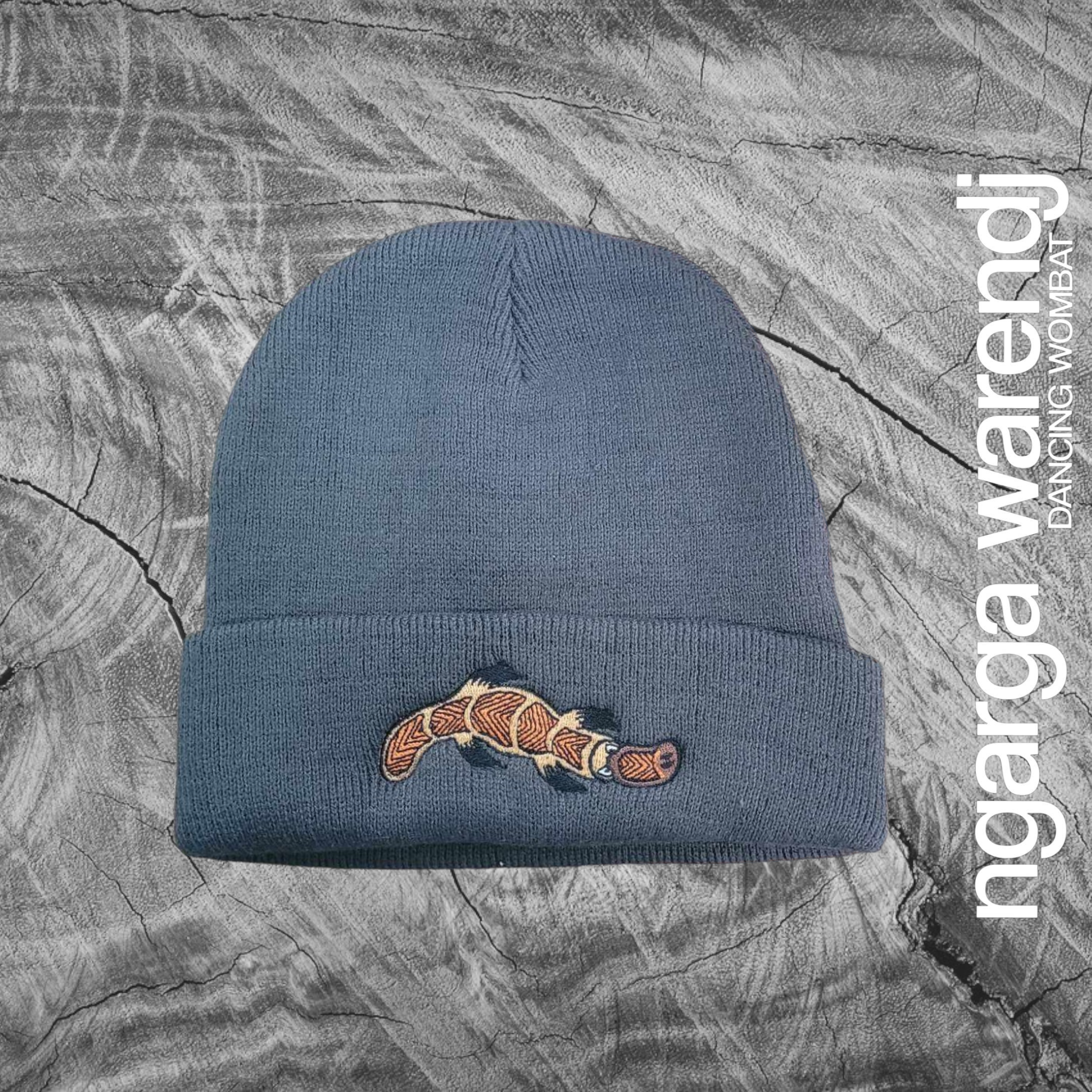 NGARGA WARENDJ BEANIE - SLATE GREY EMBROIDERED WITH BUDJA PLATYPUS BROWN DESIGN