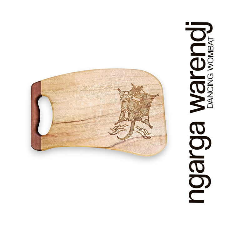 Wooden cutting board with laser engraving on a white background, featuring the brand 'ngarga warendj'.
