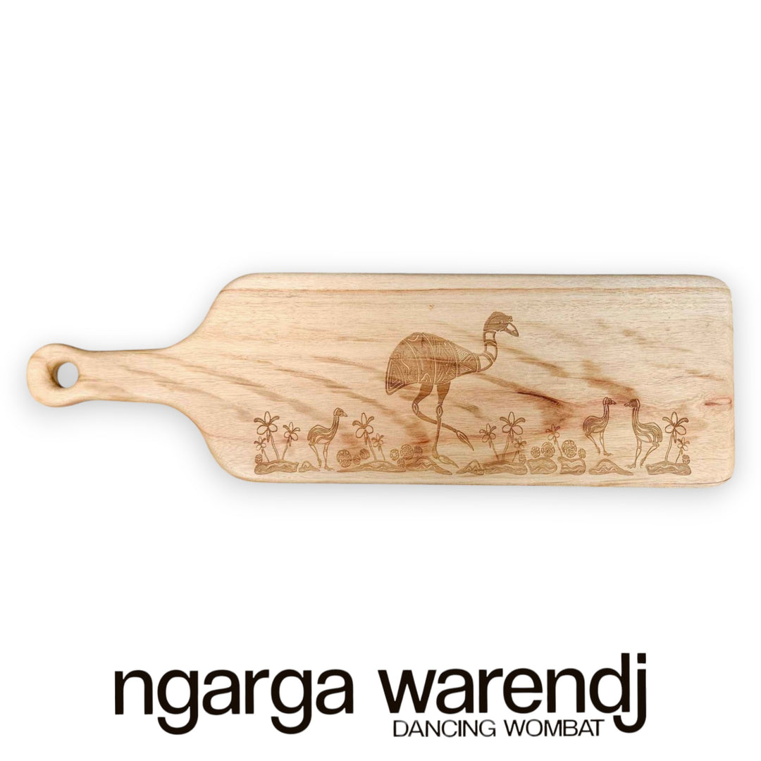 Wooden cutting board with engraved design of animals on a white background, featuring the brand 'ngarga warendj'.
