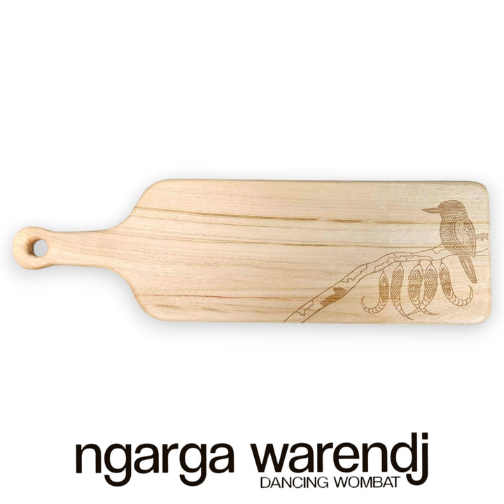 Wooden cutting board with engraved design on a white background, featuring the brand 'ngarga warendj'.