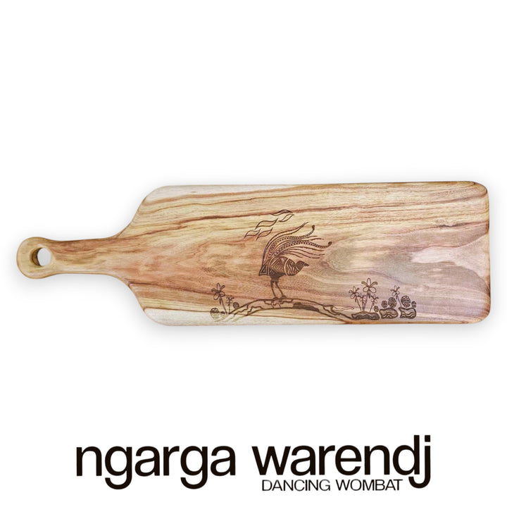 Wooden cutting board with engraved design on a white background, featuring the brand 'ngarga warendj'.