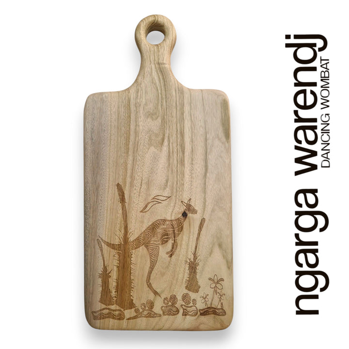 Wooden cutting board with kangaroo engraving and 'ngarga warendj' branding on a white background