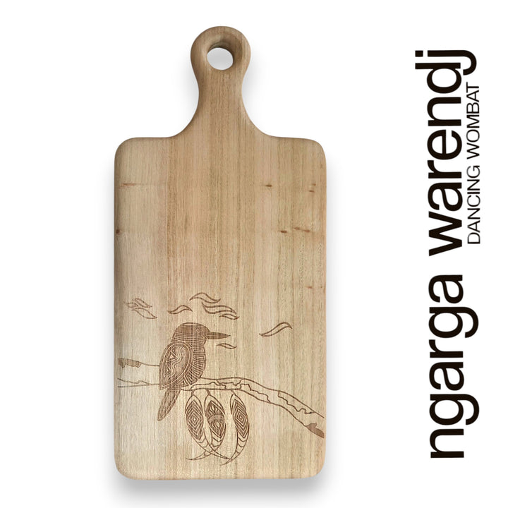 Wooden cutting board with engraved design on a white background, featuring the brand 'ngarga warendj'.