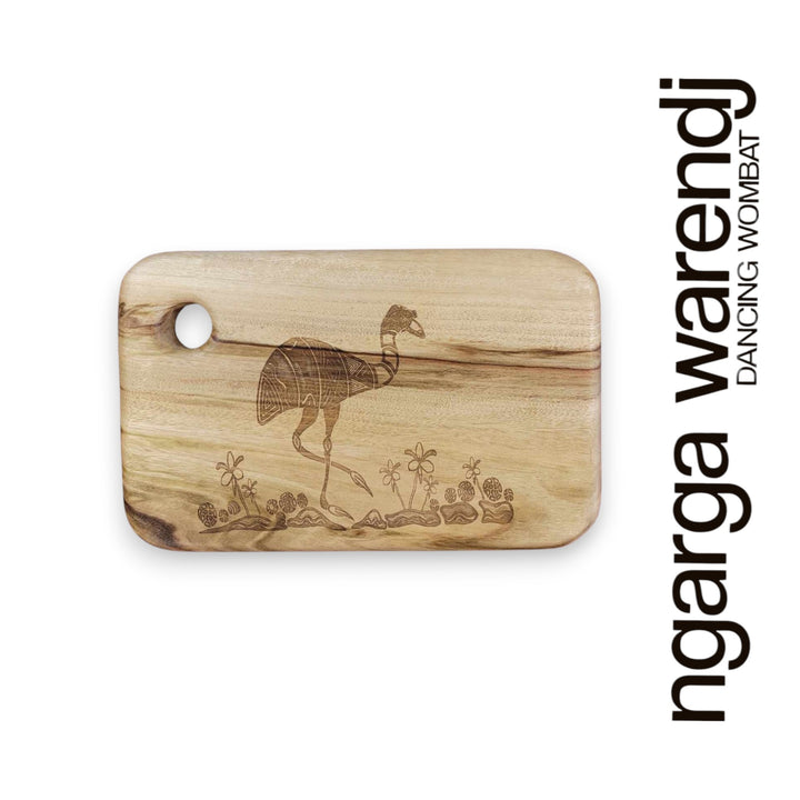 Wooden cutting board with engraved design on a white background, featuring the brand 'ngarga warendj'.