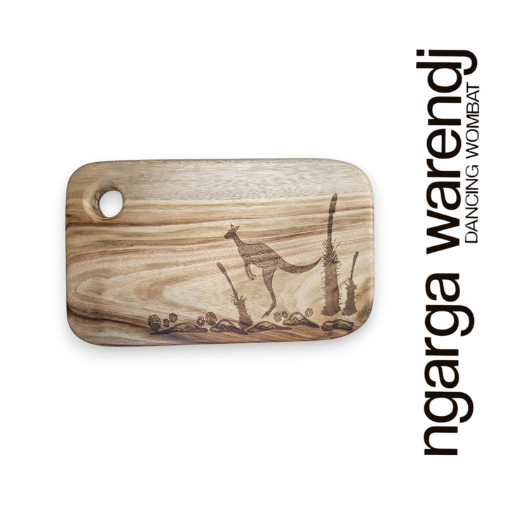 Wooden cutting board with kangaroo design and 'ngarga warendj' branding on a white background