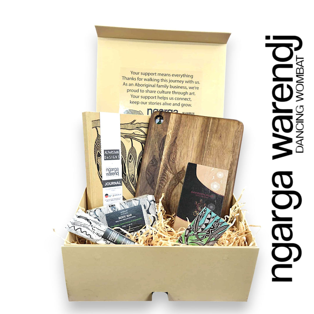 Gift box with wooden items and stationery, featuring 'ngarga wardenj' branding.