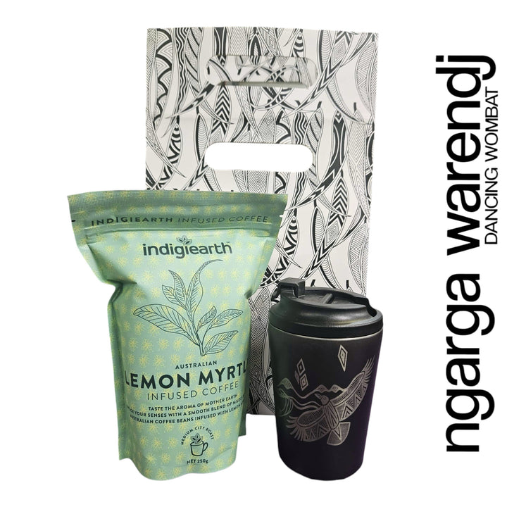 Indigiearth lemon myrtle infused coffee package with a black reusable cup on a white background, featuring the ngarga wardenj brand.