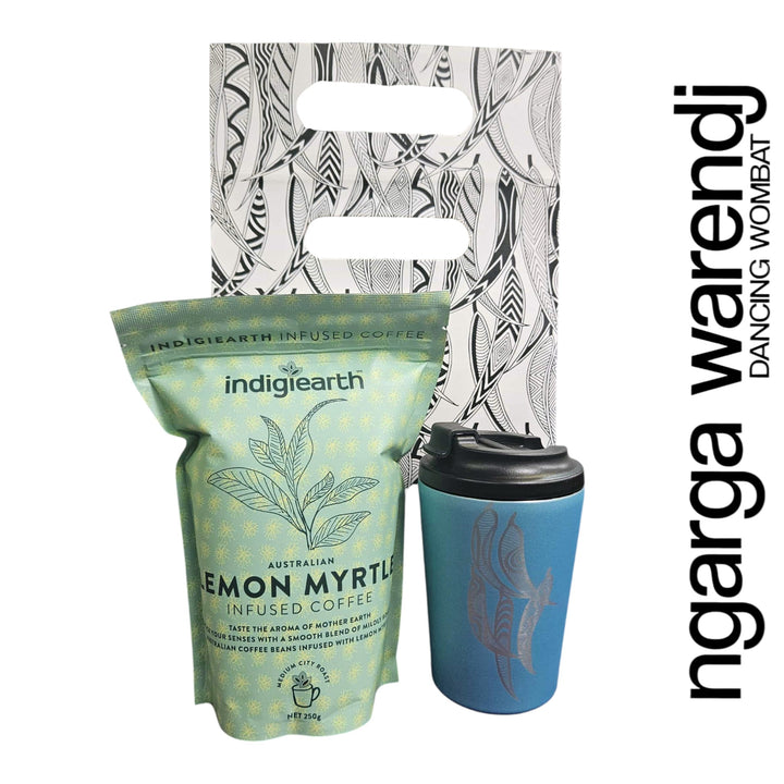 Indigearth lemon myrtle infused coffee package with a blue reusable cup on a white background, featuring the ngarga wardenj brand.