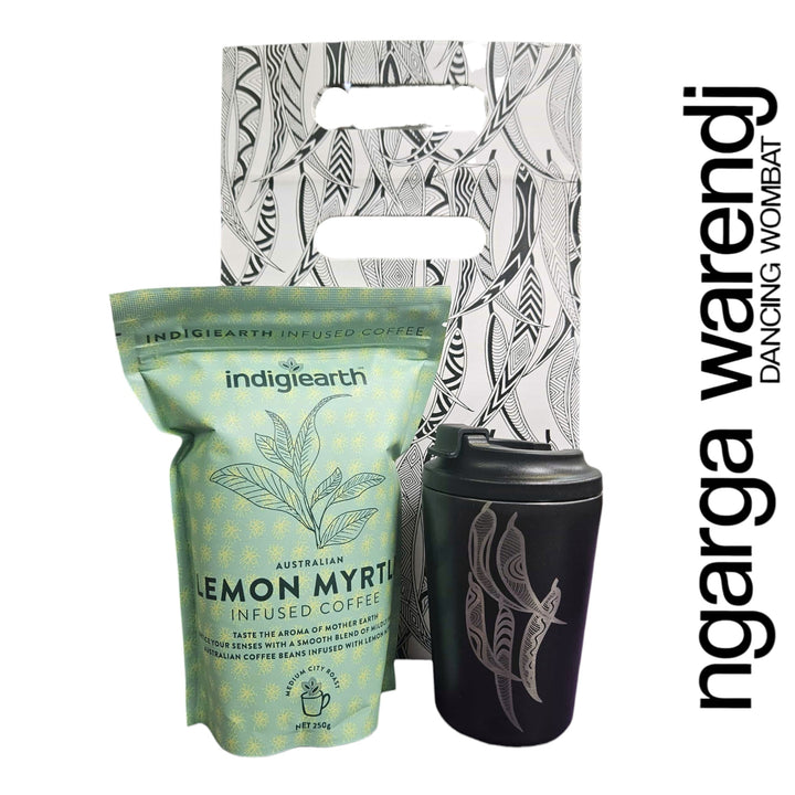 Indigiearth lemon myrtle infused coffee package with a black tumbler and decorative packaging on a white background.
