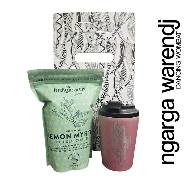 Indigiearth lemon myrtle coffee package with a pink tumbler and branded bag on a white background.