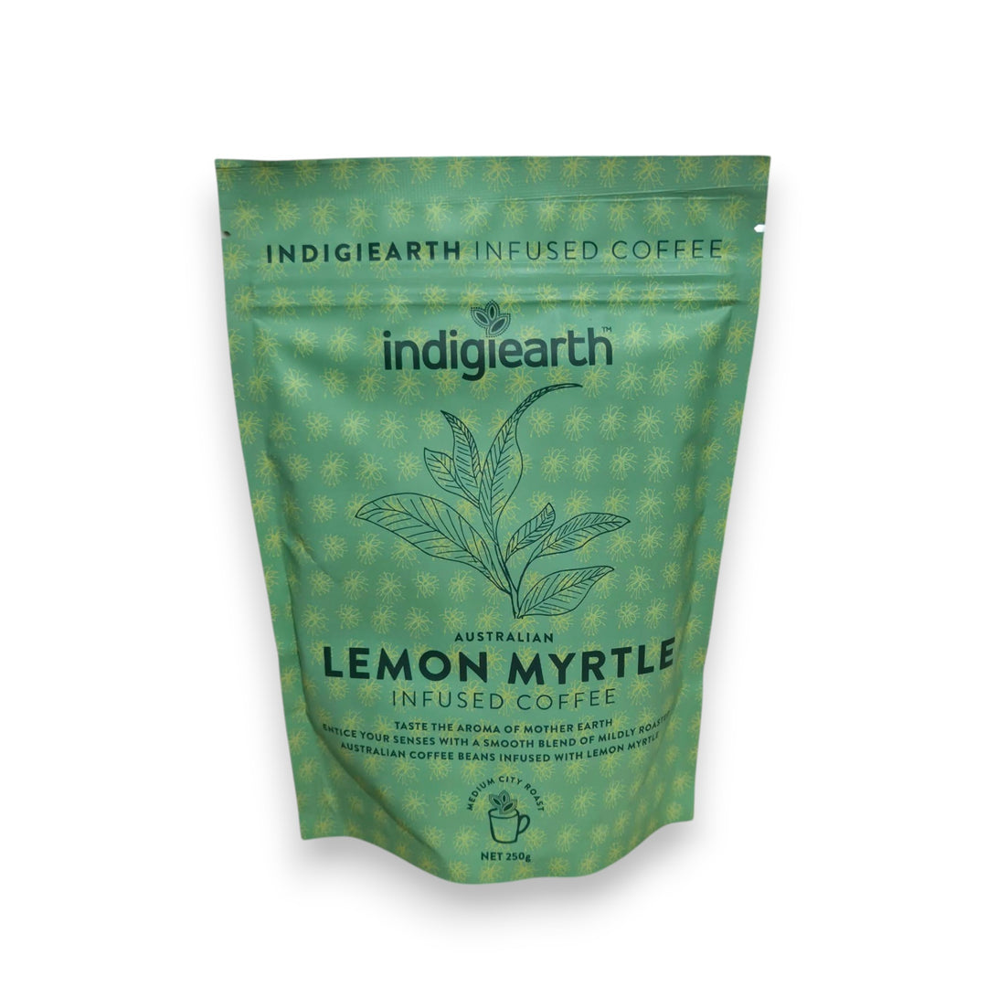 A green stand-up pouch of Indigiearth Lemon Myrtle Infused Coffee on a plain white background.