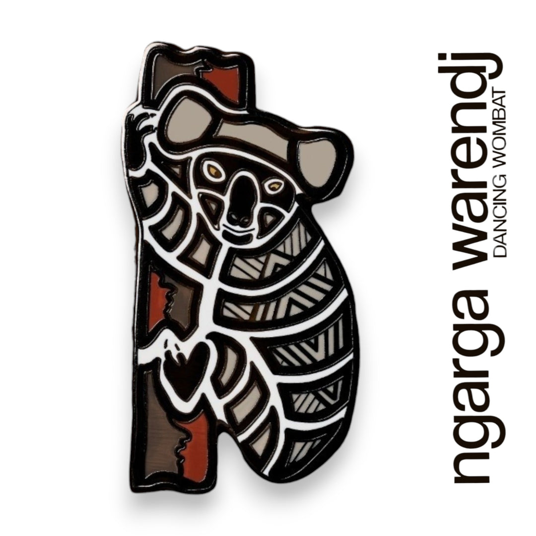 Decorative pin of a koala with tribal patterns on a white background, featuring the brand 'ngarga warendj'.
