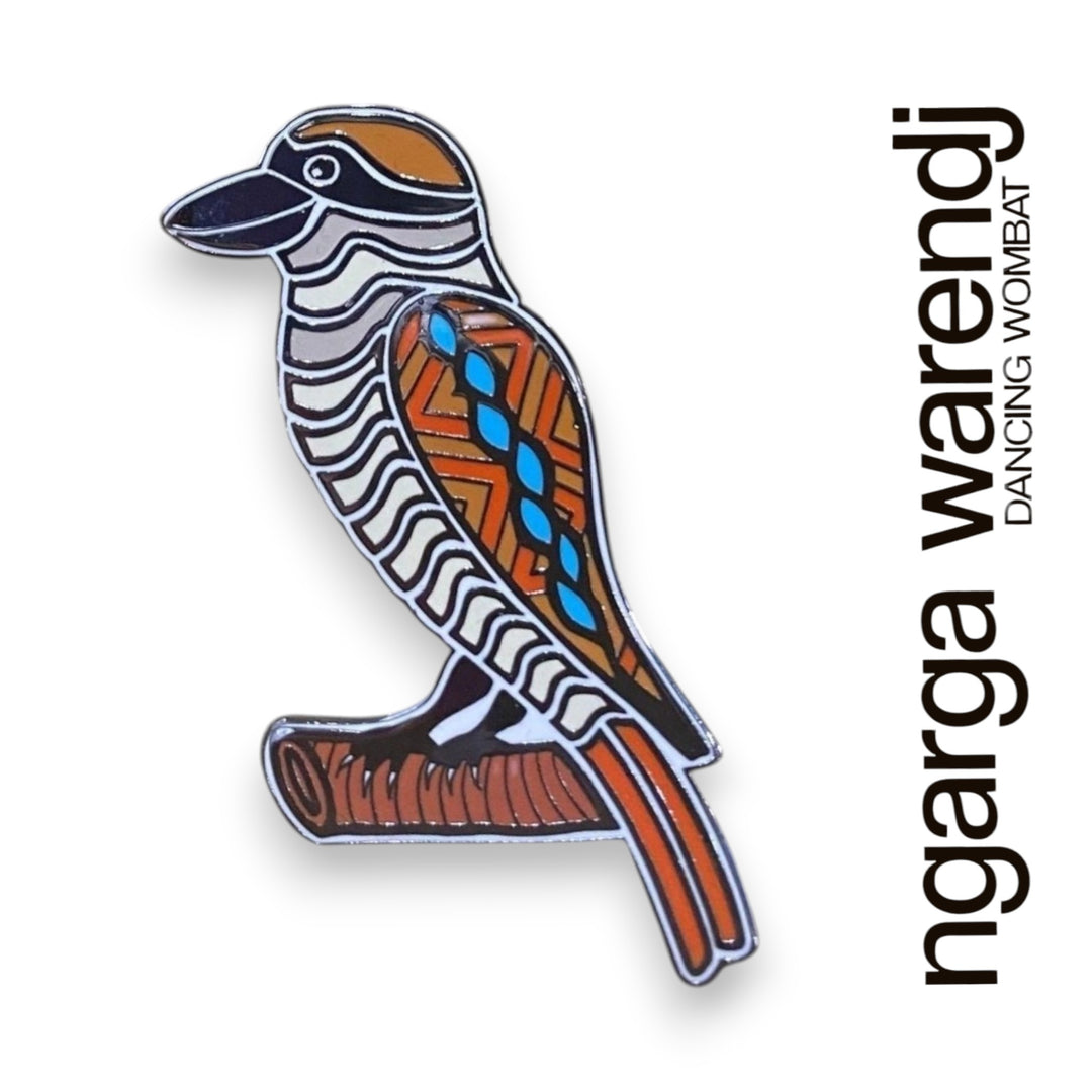 Colorful kookaburra bird-shaped pin with 'ngarga warendj' text on a white background