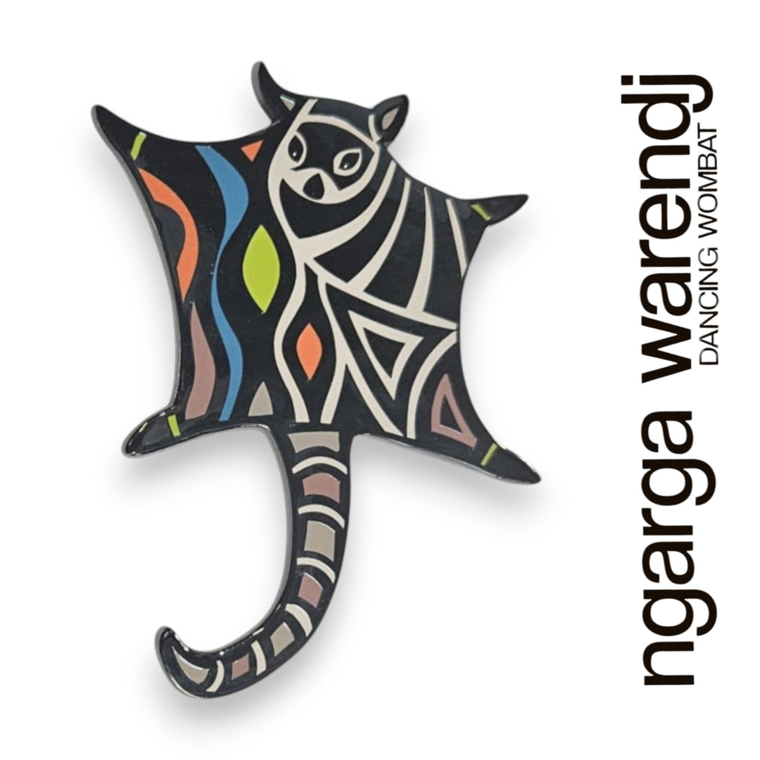 Colorful Aboriginal art design of a possum glider on a white background with 'ngarga warendj' text.