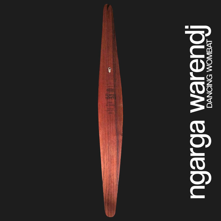 Back of large Dhulin Goanna wall shield showing red cedar grain, engraved Ngarga Warendj branding and metal wall hanger.