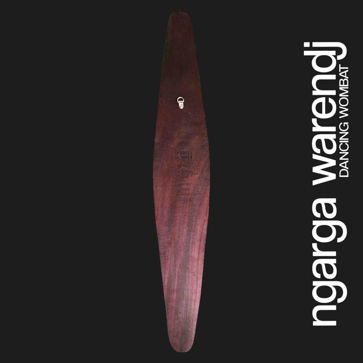 Back of medium Dhulin Goanna wall shield showing red cedar grain, engraved branding and an attached metal wall hanger.