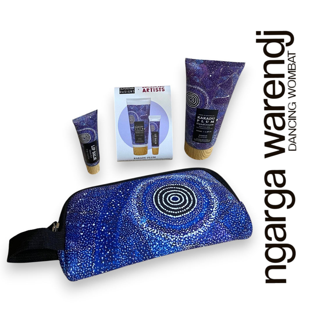 Gift box with various items including a pouch with hand cream and lip balm , hand and body wash, chocolate and card, branded 'ngarga warendj'.