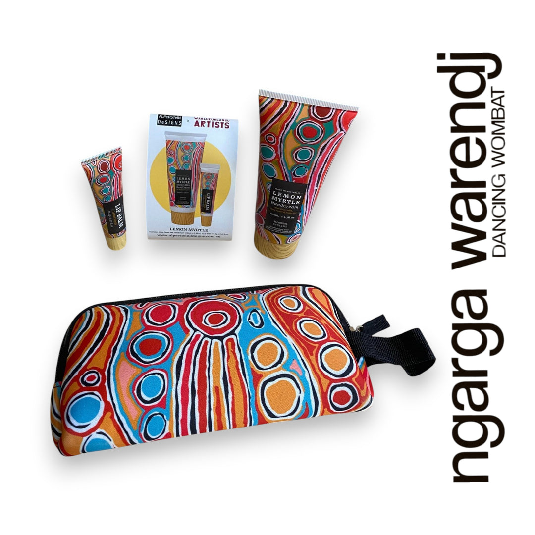 Gift box with various items including a pouch with hand cream and lip balm , hand and body wash, chocolate and card, branded 'ngarga warendj'.
