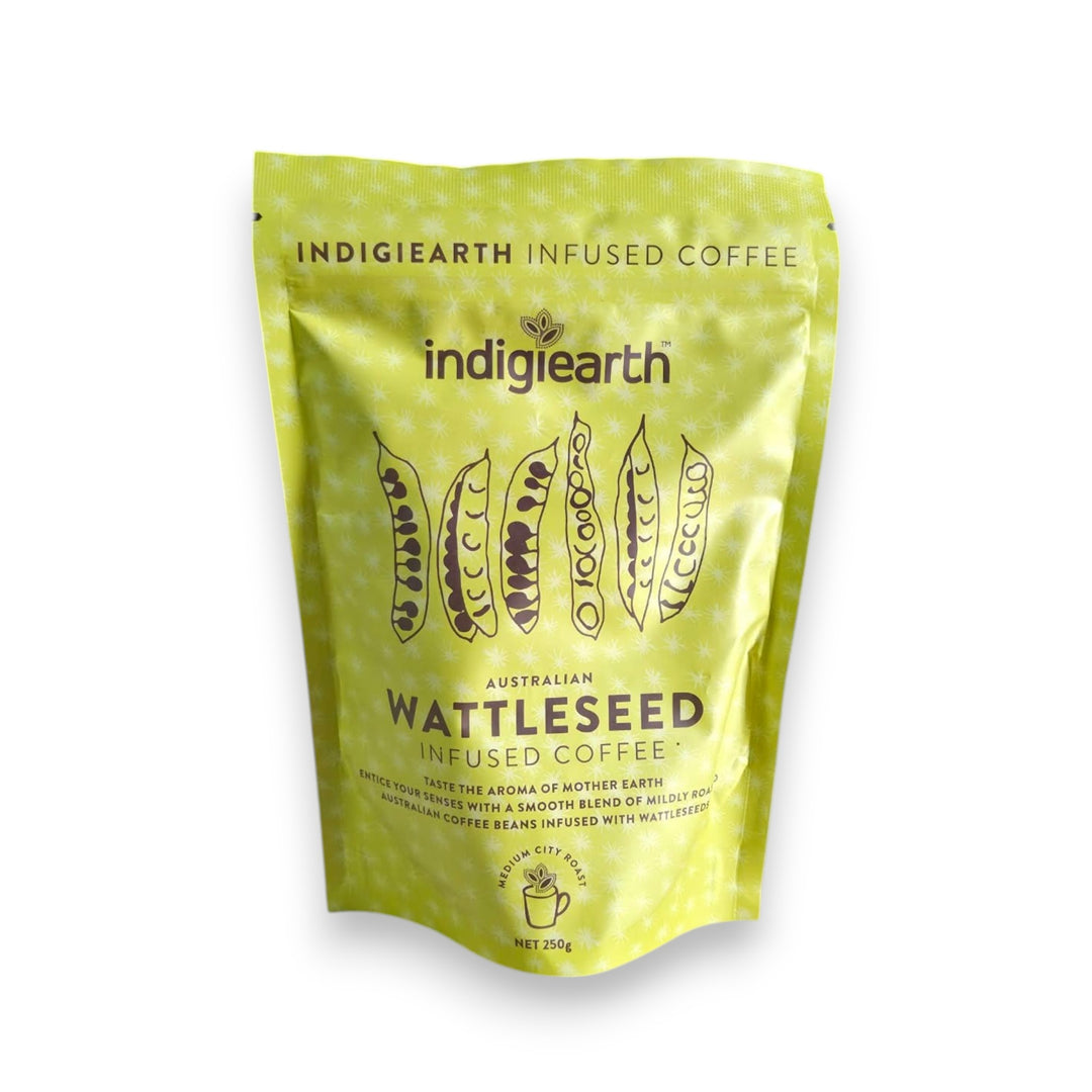 A stand-up pouch of Indigiearth Wattleseed Infused Coffee in a bright yellow-green color, featuring illustrations of wattleseed pods and product details on a white background.