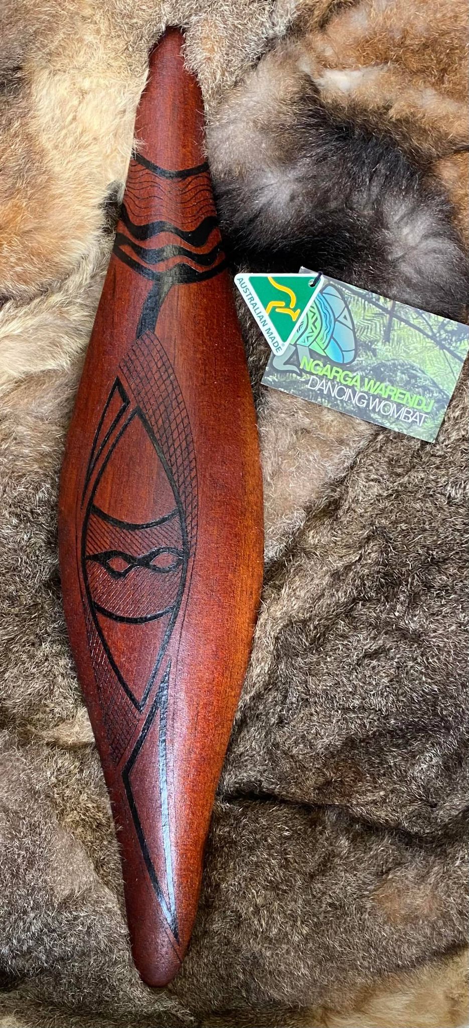 Many Gum Leaves “Djerrang-U Wurrdhadindu” Green gum leaves are burnt in a “darnuk” or wooden bowl. This creates smoke, which we invite visitors to walk through to be cleansed and welcomed to our country. Womindjeka - Welcome. Ngarga Warendj Dancing Wombat Mick Harding South East Aboriginal Art