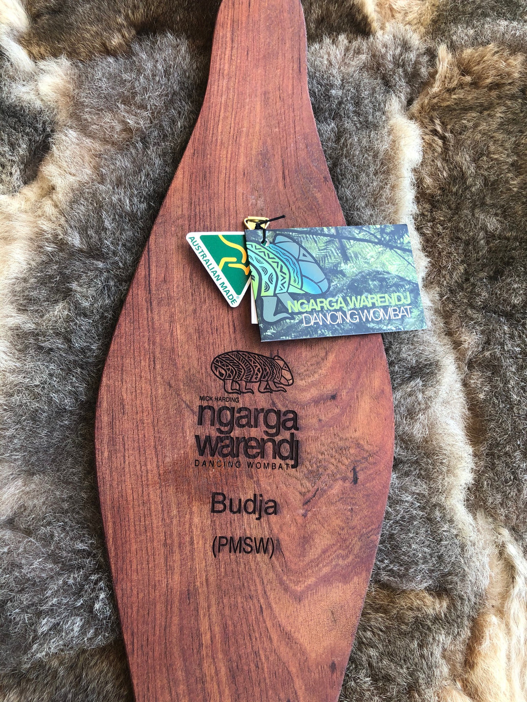 Parrying Malgarr Shield with Budja the Platypus Design.    Hand crafted in Australia from Australian Red Cedar timber. All artefacts come with an information card.   The card has information about the artist, artefact and design.   All designs are based on traditional symbols from South East Australia.