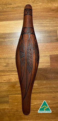 Parrying Malgarr Shield with Womindjeka Gum Leaves Design.     Traditionally malgarr ( shields ) were used with liyangayil  ( fighting clubs) for hand to hand combat with our enemies.   I have replicated the shape of these shields in my artwork.