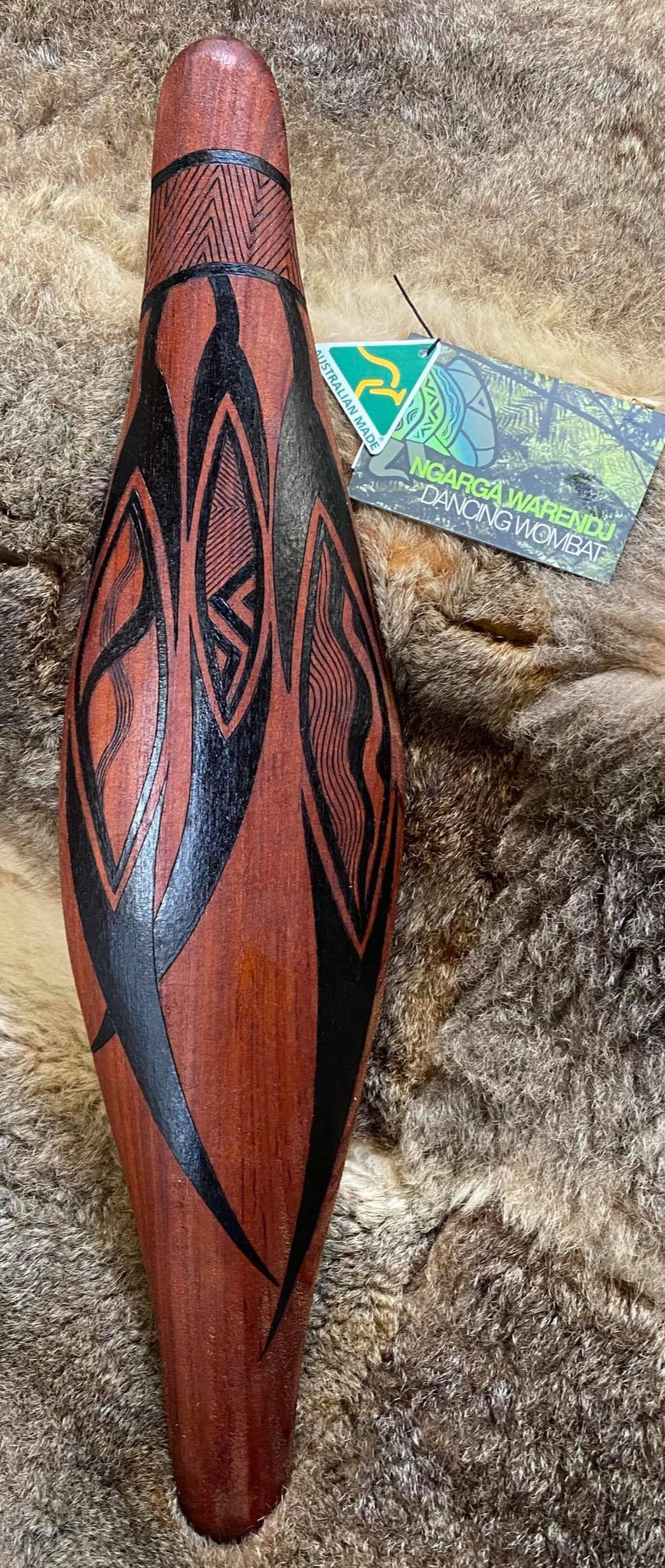Many Gum Leaves  “Djerrang-U Wurrdhadindu” Green gum leaves are burnt in a “darnuk” or wooden bowl.  This creates smoke, which we invite visitors to walk through to be cleansed and welcomed to our country. Womindjeka - Welcome.  Ngarga Warendj Dancing Wombat Mick Harding South East Aboriginal Art 