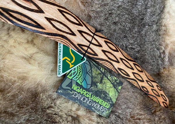 Large Barring Tracks Wangim / Boomerang. Hand Crafted in Australia by Ngarga Warendj. All our wangim are made from timber collected from tree roots or branches that have a natural bend. All designs are based on traditional symbols from South East Australia