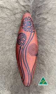 Traditionally malgarr ( shields ) were used with liyangayil ( fighting clubs) for hand to hand combat with our enemies. I have replicated the shape ofthese shields in my artwork. The Kwambee djak or common tree fern was used as a staple food by our old people during the Warendj (wombat season) or cooler months. Handcrafted in Australia from Australian Red Cedar by Mick Harding Ngarga Warendj Dancing Wombat