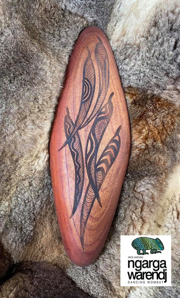 Wall Malgarr Shield with Womindjeka Gum Leaves Design. Traditionally malgarr ( shields ) were used with liyangayil ( fighting clubs) for hand to hand combat with our enemies. I have replicated the shape ofthese shields in my artwork.
